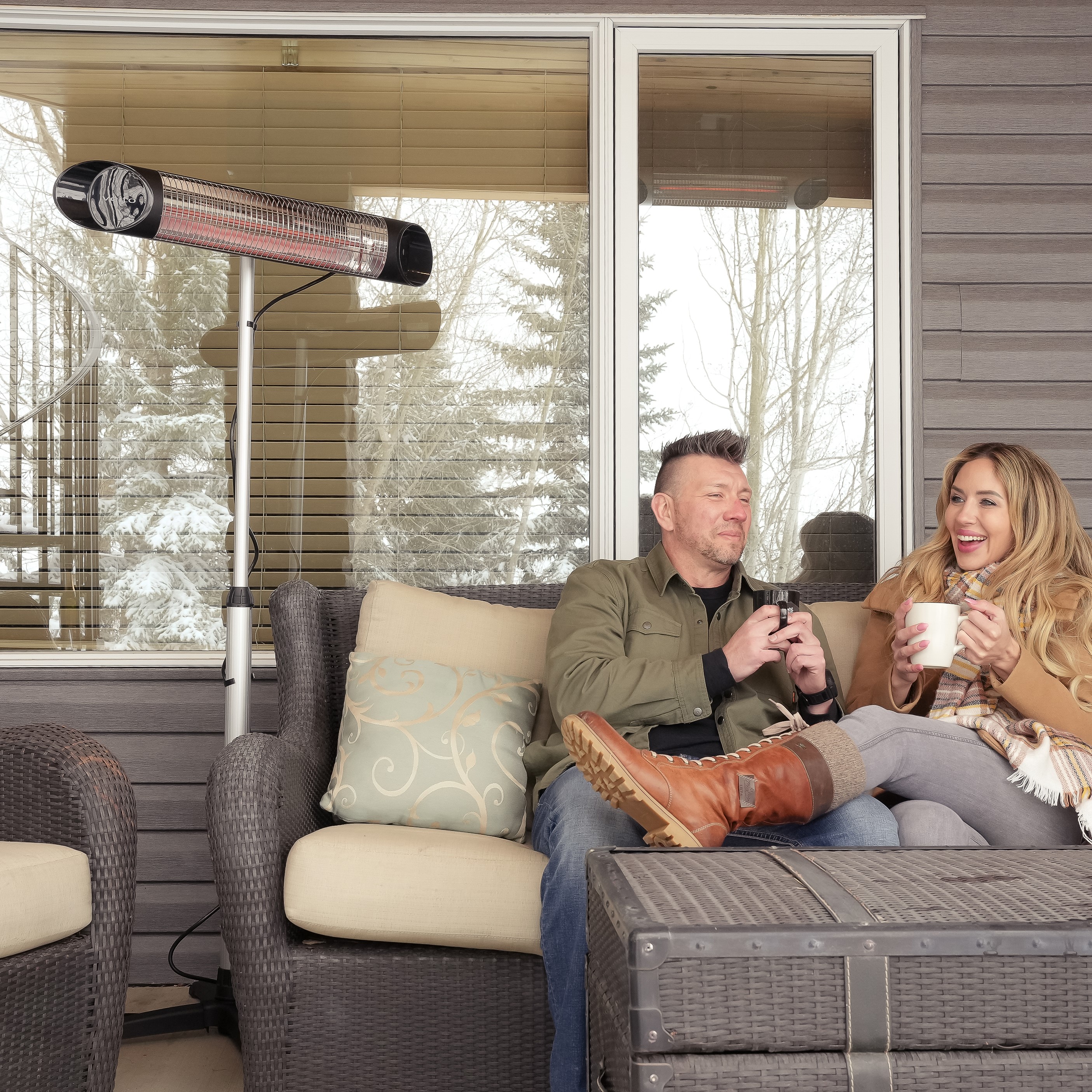 couple on patio with heater